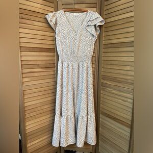 Ditsy daisy floral-print dress with butterfly sleeves & elastic waist.